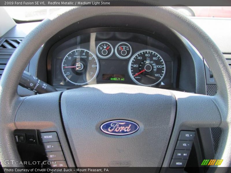 Redfire Metallic / Medium Light Stone 2009 Ford Fusion SE V6