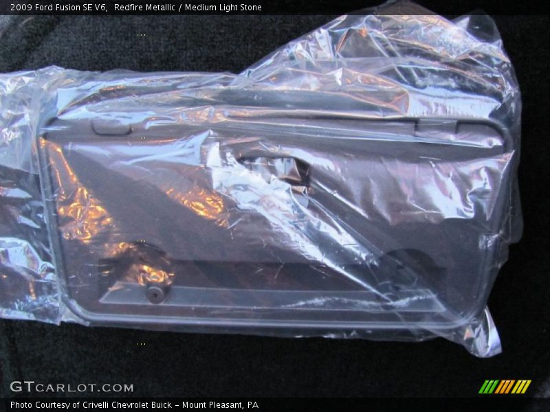 Redfire Metallic / Medium Light Stone 2009 Ford Fusion SE V6