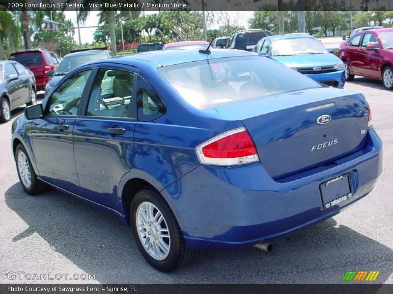 Vista Blue Metallic / Medium Stone 2009 Ford Focus SE Sedan