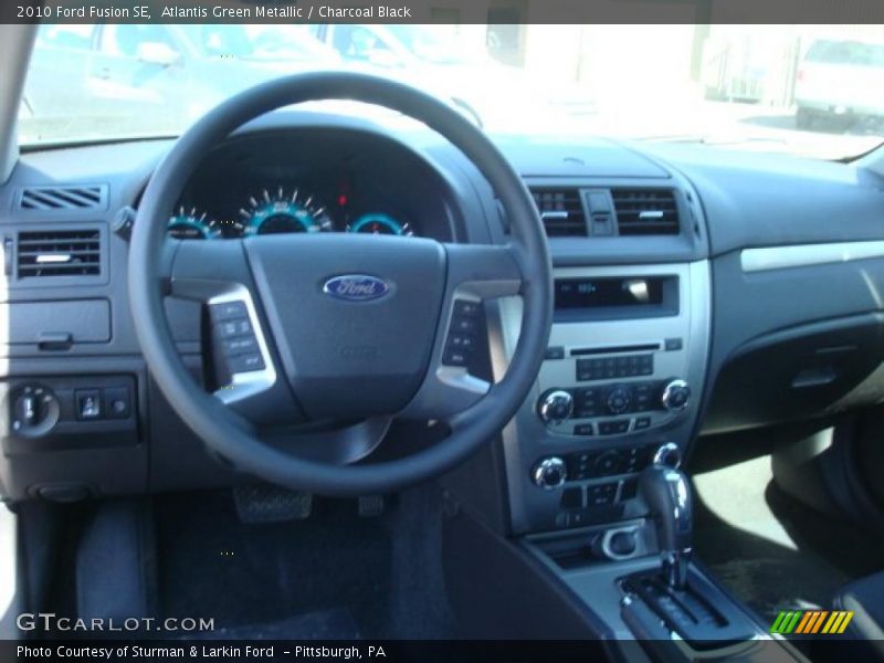Atlantis Green Metallic / Charcoal Black 2010 Ford Fusion SE