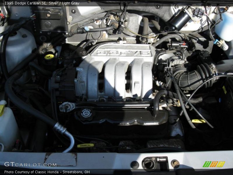 Silver / Light Gray 1995 Dodge Caravan SE