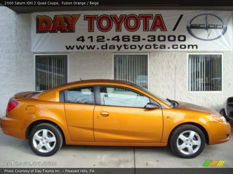 Fusion Orange / Beige 2006 Saturn ION 2 Quad Coupe
