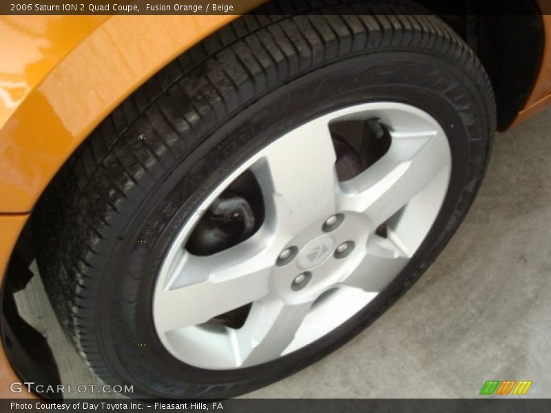 Fusion Orange / Beige 2006 Saturn ION 2 Quad Coupe