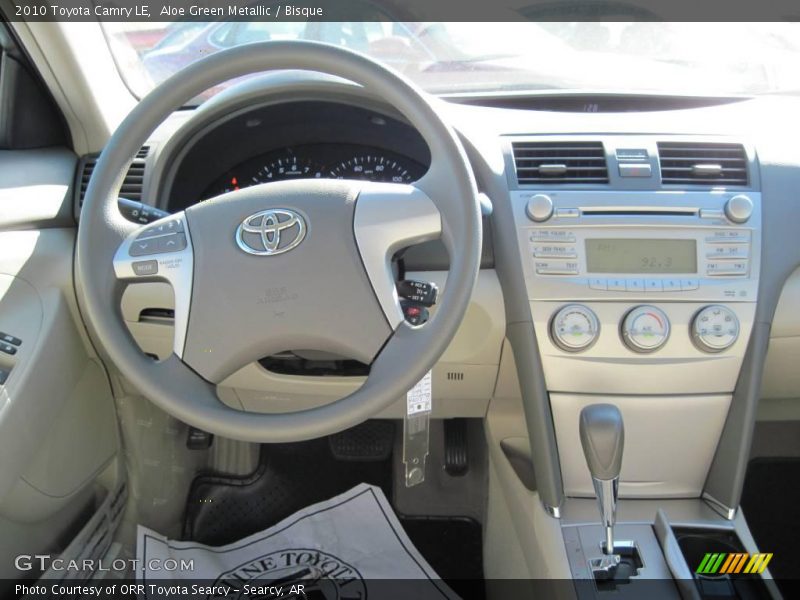 Aloe Green Metallic / Bisque 2010 Toyota Camry LE