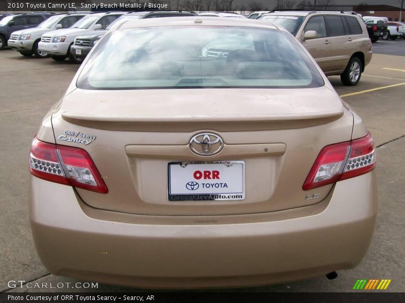 Sandy Beach Metallic / Bisque 2010 Toyota Camry LE