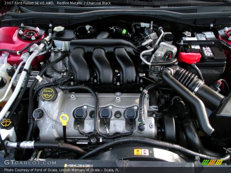 Redfire Metallic / Charcoal Black 2007 Ford Fusion SE V6 AWD
