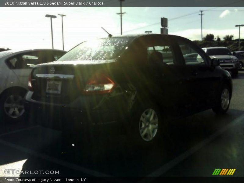 Super Black / Charcoal 2010 Nissan Versa 1.8 S Sedan