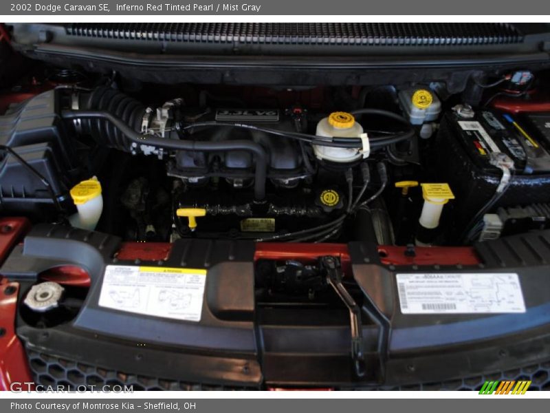 Inferno Red Tinted Pearl / Mist Gray 2002 Dodge Caravan SE