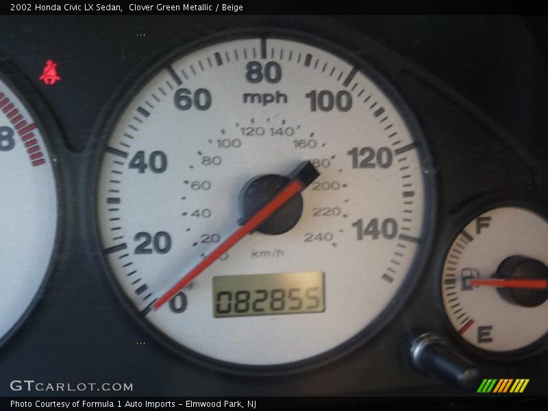 Clover Green Metallic / Beige 2002 Honda Civic LX Sedan