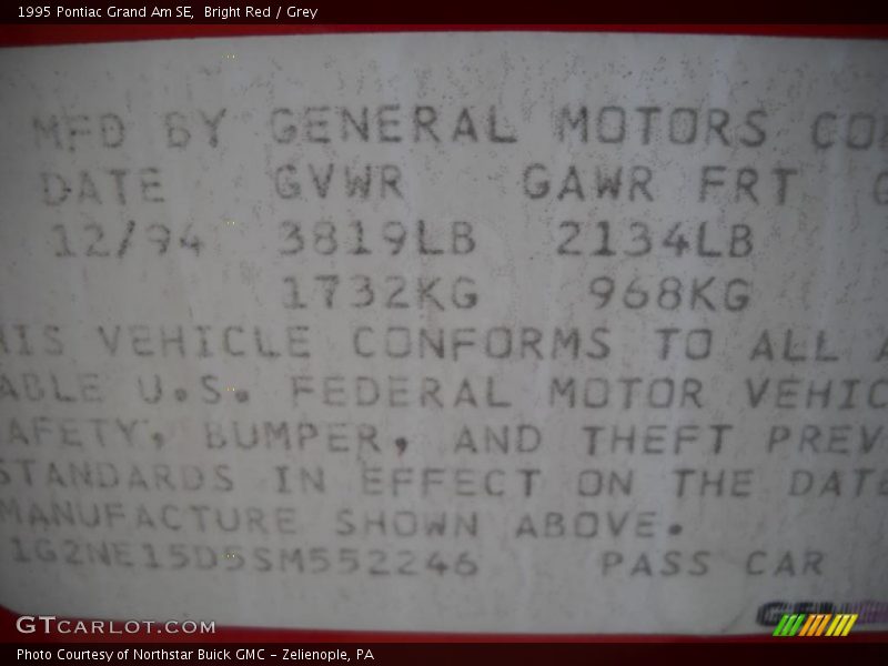 Bright Red / Grey 1995 Pontiac Grand Am SE