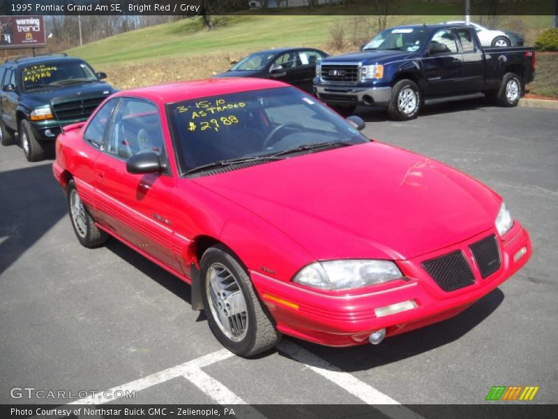 Bright Red / Grey 1995 Pontiac Grand Am SE