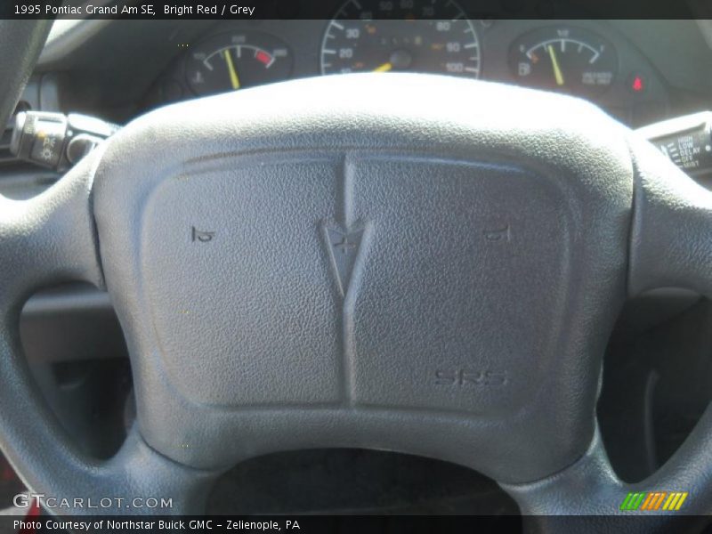 Bright Red / Grey 1995 Pontiac Grand Am SE