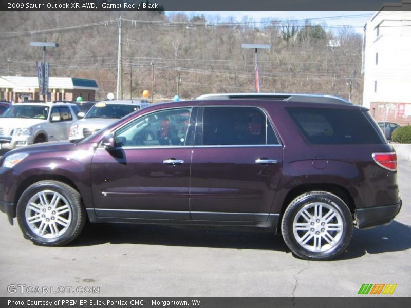 Garnet Red / Black 2009 Saturn Outlook XR AWD