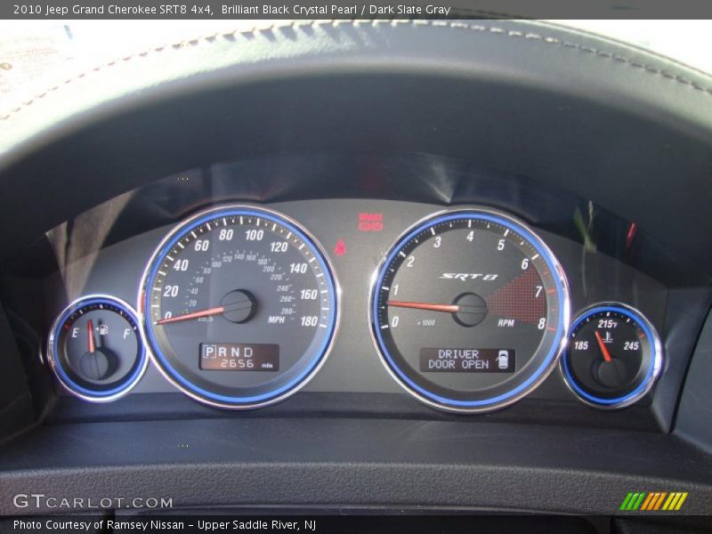 Brilliant Black Crystal Pearl / Dark Slate Gray 2010 Jeep Grand Cherokee SRT8 4x4
