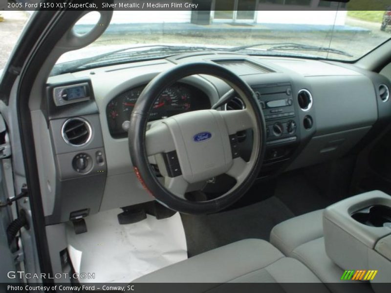 Silver Metallic / Medium Flint Grey 2005 Ford F150 XLT SuperCab