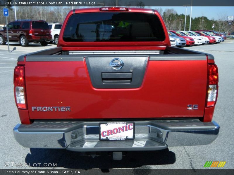 Red Brick / Beige 2010 Nissan Frontier SE Crew Cab