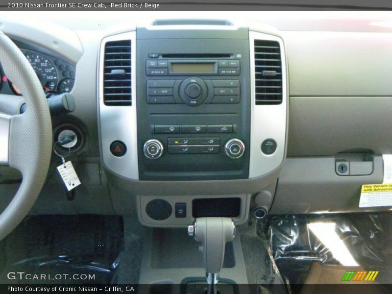 Red Brick / Beige 2010 Nissan Frontier SE Crew Cab