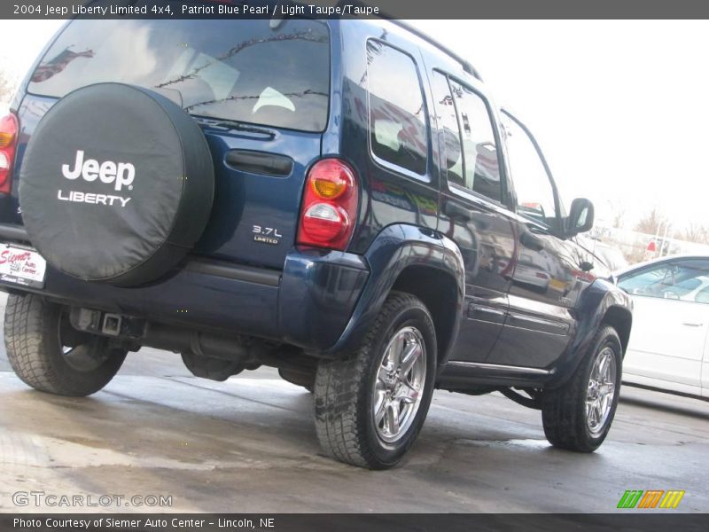 Patriot Blue Pearl / Light Taupe/Taupe 2004 Jeep Liberty Limited 4x4