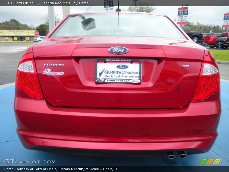 Sangria Red Metallic / Camel 2010 Ford Fusion SE