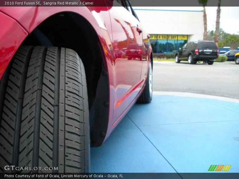 Sangria Red Metallic / Camel 2010 Ford Fusion SE