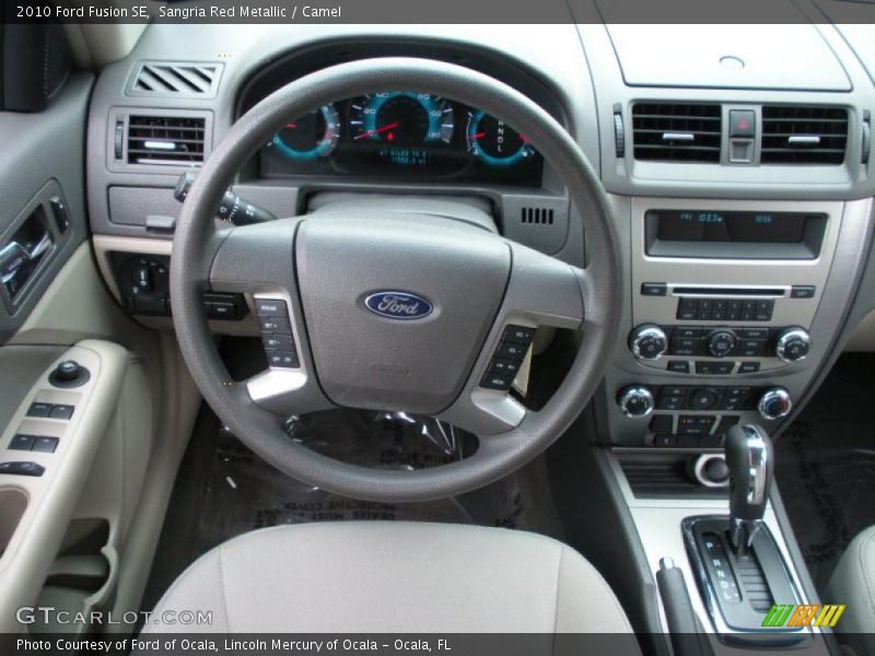 Sangria Red Metallic / Camel 2010 Ford Fusion SE