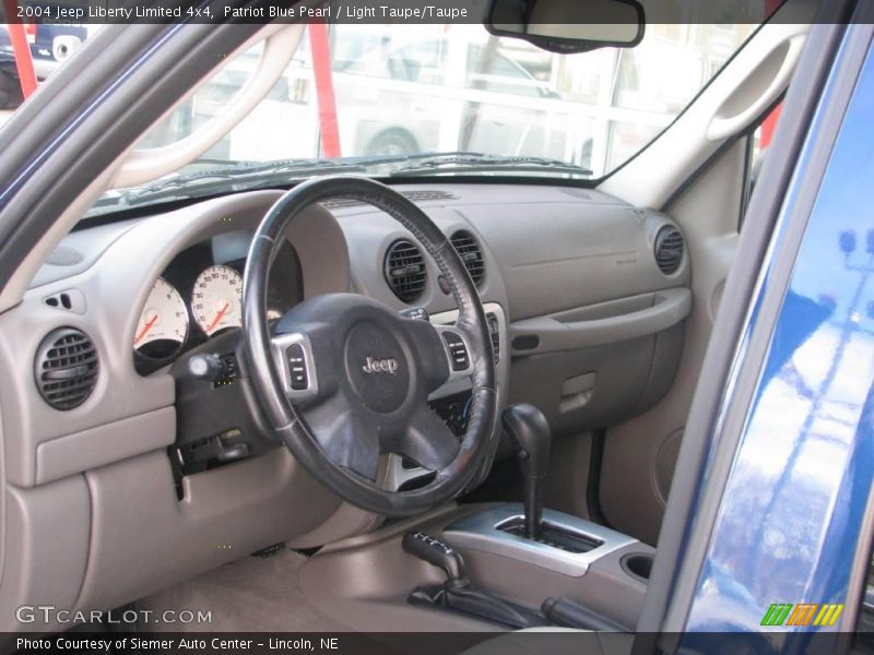 Patriot Blue Pearl / Light Taupe/Taupe 2004 Jeep Liberty Limited 4x4