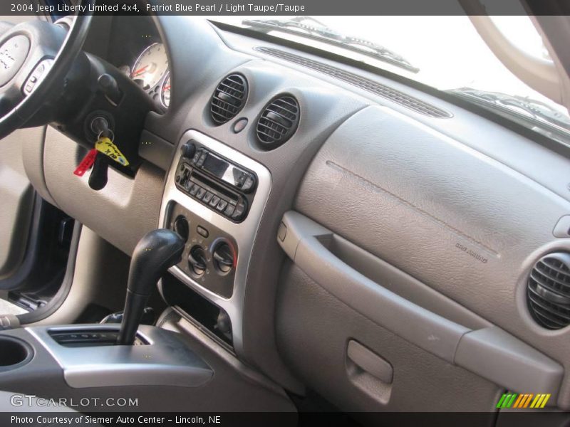 Patriot Blue Pearl / Light Taupe/Taupe 2004 Jeep Liberty Limited 4x4