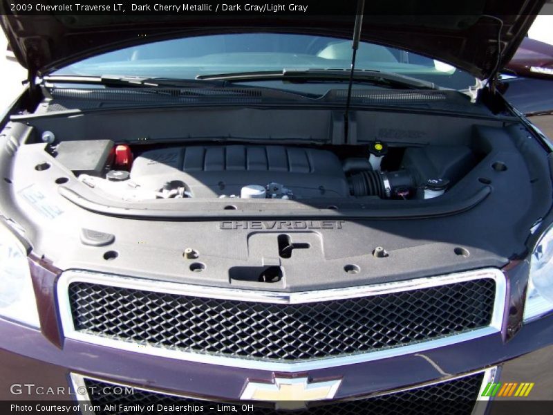 Dark Cherry Metallic / Dark Gray/Light Gray 2009 Chevrolet Traverse LT