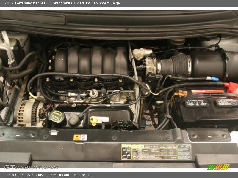 Vibrant White / Medium Parchment Beige 2002 Ford Windstar SEL