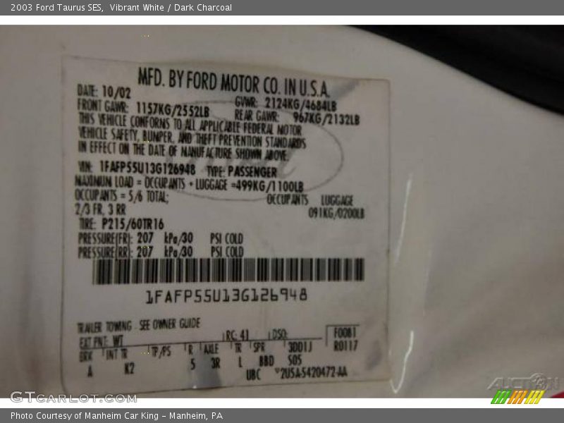 Vibrant White / Dark Charcoal 2003 Ford Taurus SES