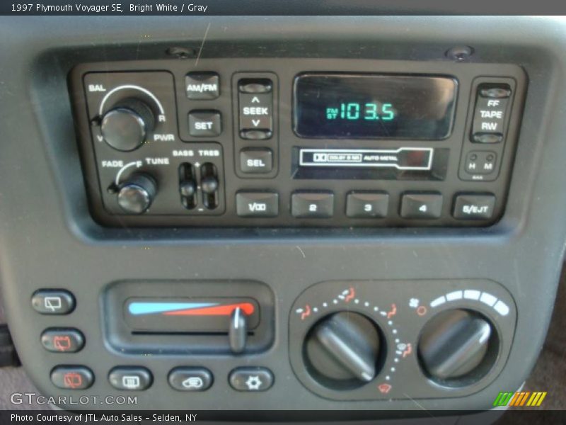 Bright White / Gray 1997 Plymouth Voyager SE
