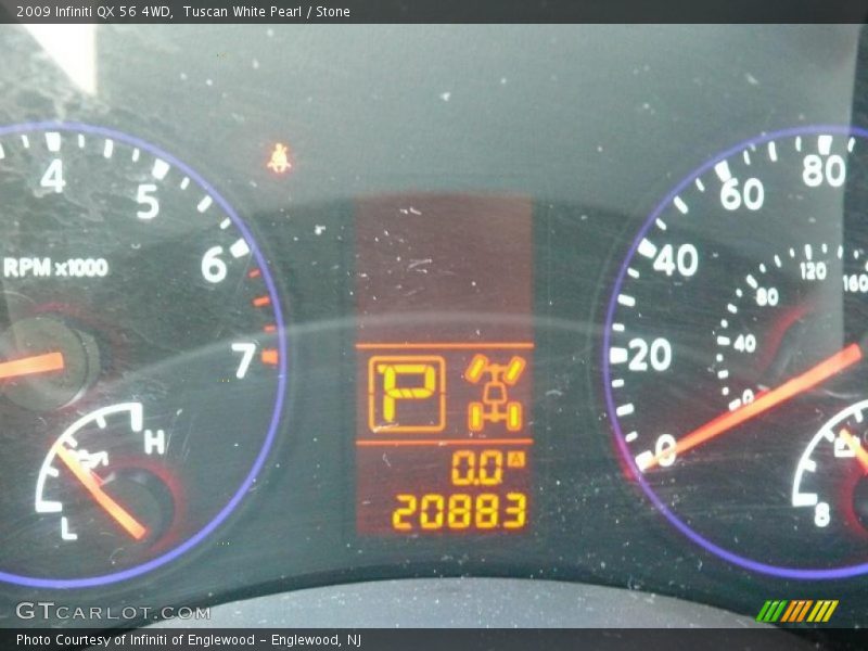 Tuscan White Pearl / Stone 2009 Infiniti QX 56 4WD