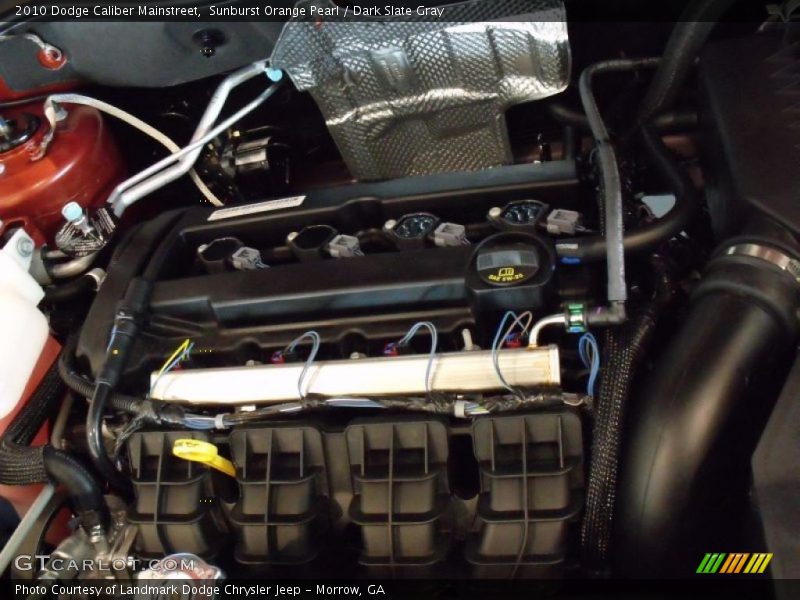 Sunburst Orange Pearl / Dark Slate Gray 2010 Dodge Caliber Mainstreet
