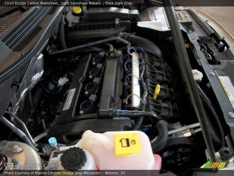 Light Sandstone Metallic / Dark Slate Gray 2010 Dodge Caliber Mainstreet