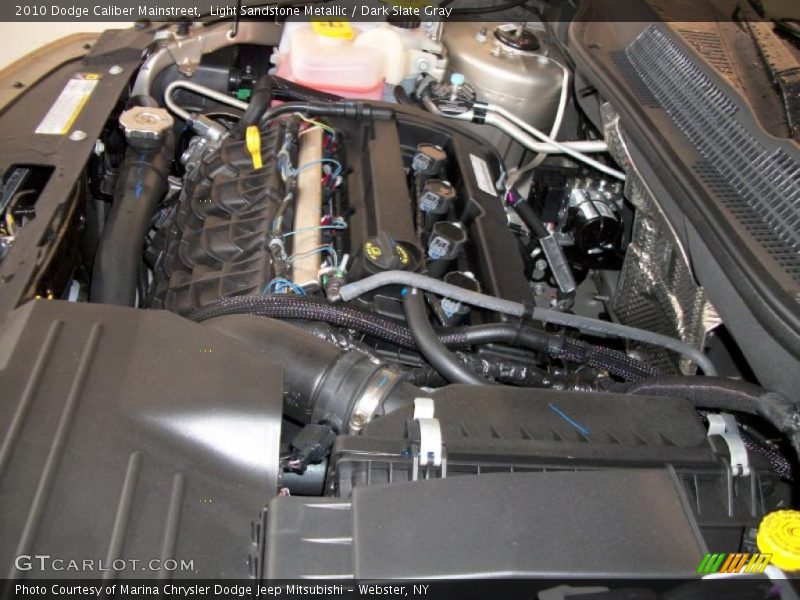 Light Sandstone Metallic / Dark Slate Gray 2010 Dodge Caliber Mainstreet