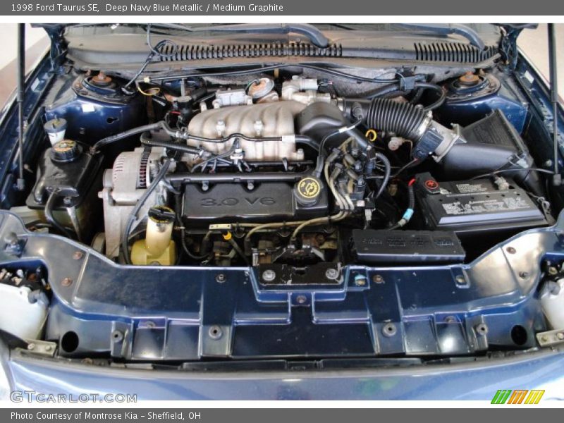 Deep Navy Blue Metallic / Medium Graphite 1998 Ford Taurus SE
