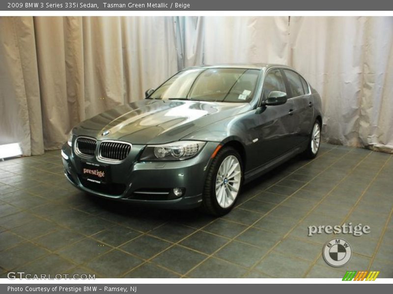 Tasman Green Metallic / Beige 2009 BMW 3 Series 335i Sedan