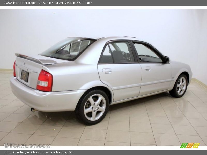 Sunlight Silver Metallic / Off Black 2002 Mazda Protege ES