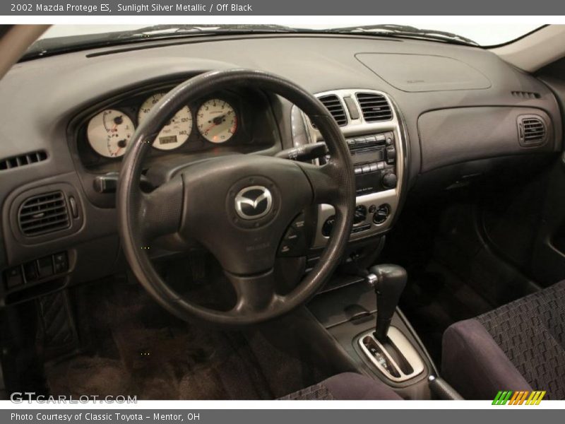 Sunlight Silver Metallic / Off Black 2002 Mazda Protege ES
