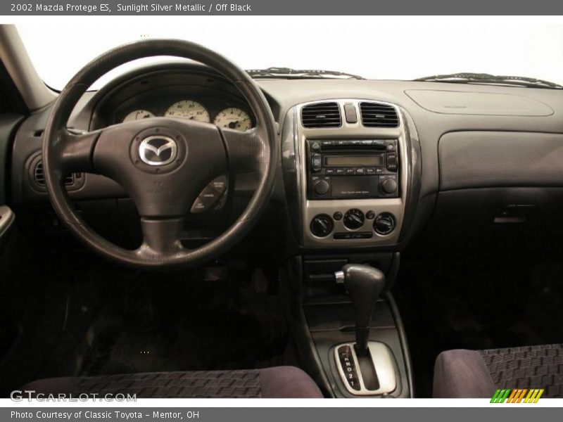 Sunlight Silver Metallic / Off Black 2002 Mazda Protege ES