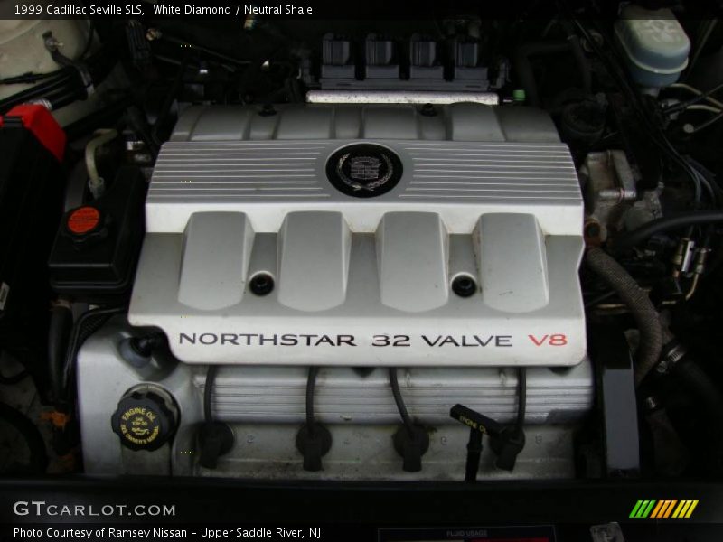 White Diamond / Neutral Shale 1999 Cadillac Seville SLS