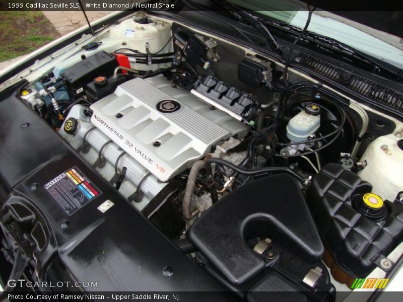 White Diamond / Neutral Shale 1999 Cadillac Seville SLS