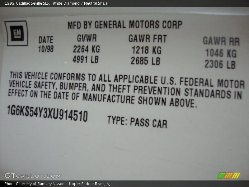 White Diamond / Neutral Shale 1999 Cadillac Seville SLS