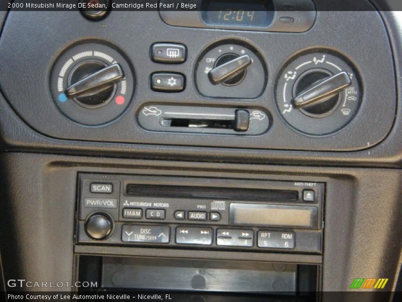 Cambridge Red Pearl / Beige 2000 Mitsubishi Mirage DE Sedan