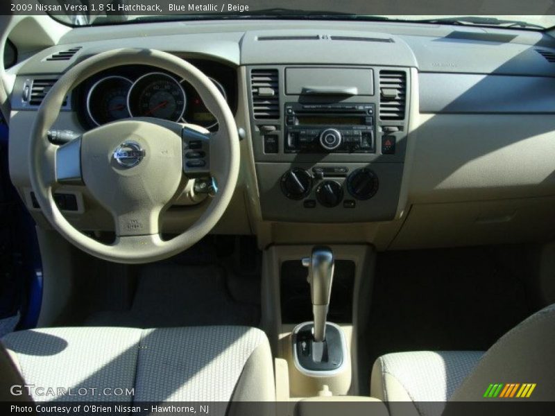 Blue Metallic / Beige 2009 Nissan Versa 1.8 SL Hatchback