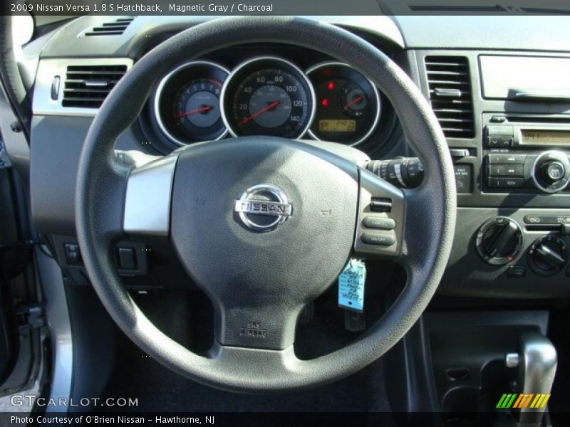 Magnetic Gray / Charcoal 2009 Nissan Versa 1.8 S Hatchback