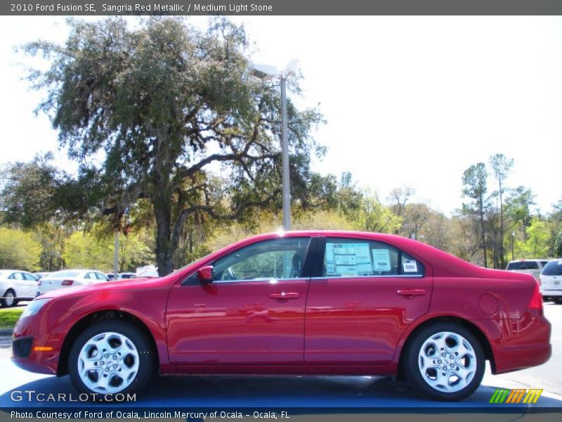 Sangria Red Metallic / Medium Light Stone 2010 Ford Fusion SE