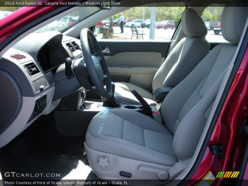 Sangria Red Metallic / Medium Light Stone 2010 Ford Fusion SE