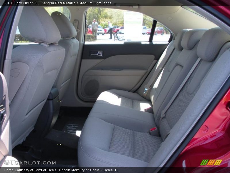 Sangria Red Metallic / Medium Light Stone 2010 Ford Fusion SE