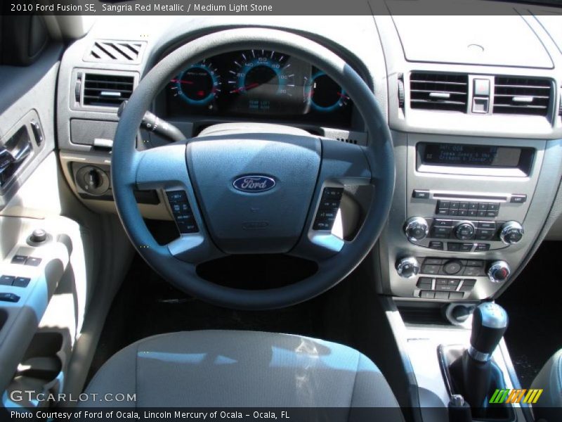 Sangria Red Metallic / Medium Light Stone 2010 Ford Fusion SE